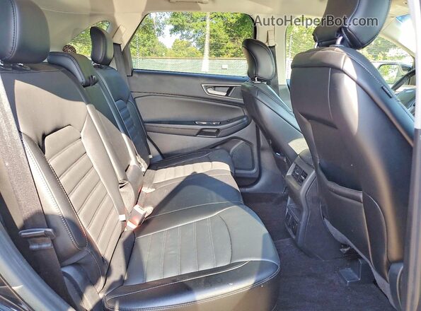 2FMPK4J96HBB66199 2017 FORD EDGE Black Սալոնի հետևի տեսք