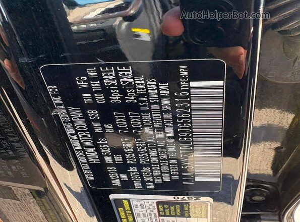 5XYZTDLB9JG562316 2018 HYUNDAI SANTA Black Rear seats view