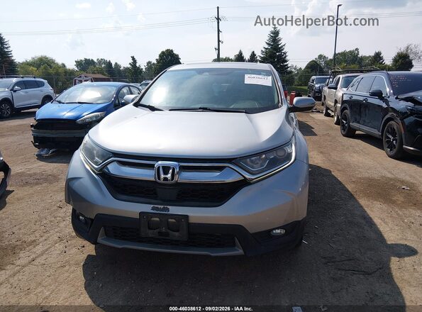 7FARW2H88JE101337 2018 HONDA CR-V Silver Սարքավորումների վահանակի տեսք