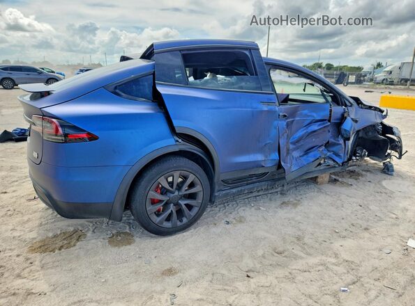 7SAXCBE67RF458537 2024 TESLA MODEL Blue Rear right