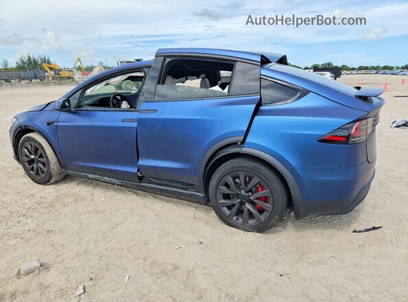7SAXCBE67RF458537 2024 TESLA MODEL Blue Rear left