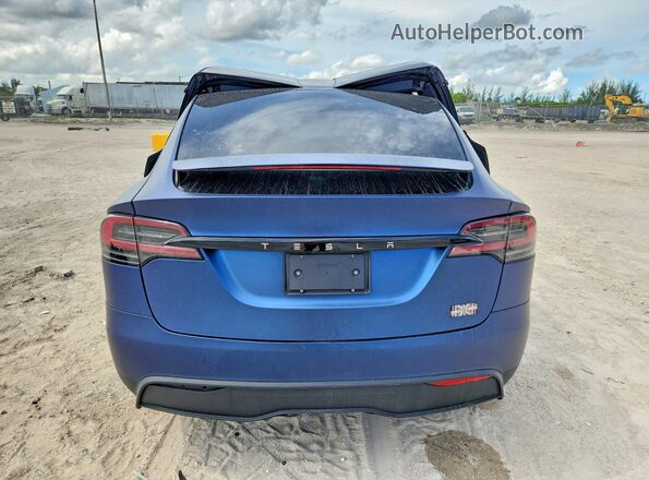 7SAXCBE67RF458537 2024 TESLA MODEL Blue Rear view
