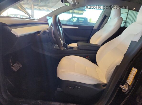 7SAYGAEE3RF130607 2024 TESLA MODEL Черный Вид салона спереди