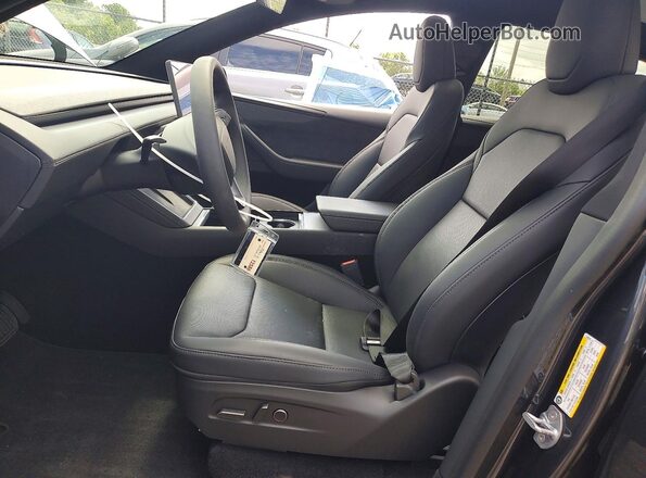 7SAYGAEE4TF610310 2026 TESLA MODEL Черный Вид салона спереди