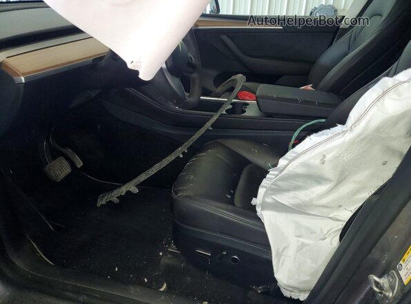 7SAYGAEE5SF287464 2025 TESLA MODEL Gray Vista interior delantera