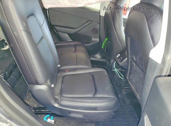 7SAYGAEE5SF287464 2025 TESLA MODEL Gray Vista interior trasera