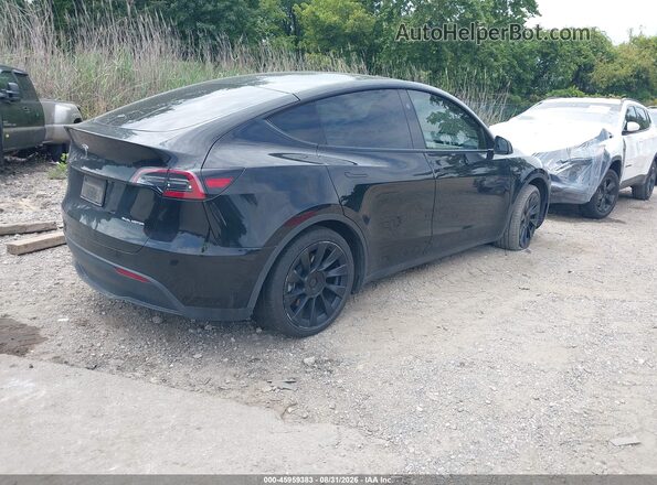 7SAYGAEE7RF982040 2024 TESLA MODEL Y Black Rear right