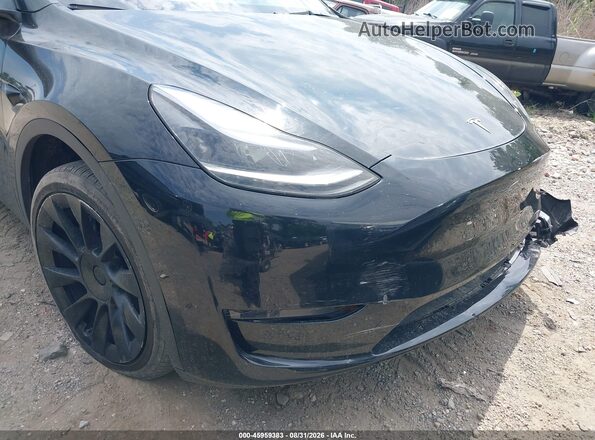 7SAYGAEE7RF982040 2024 TESLA MODEL Y Black 