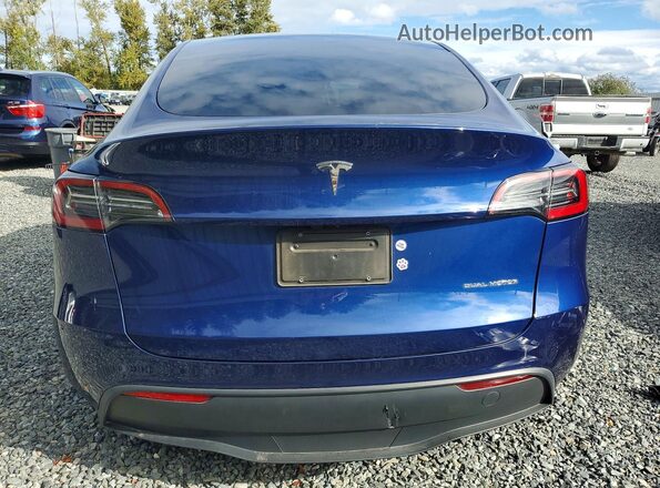 7SAYGAEEXRF982226 2024 TESLA MODEL Blue Rear view