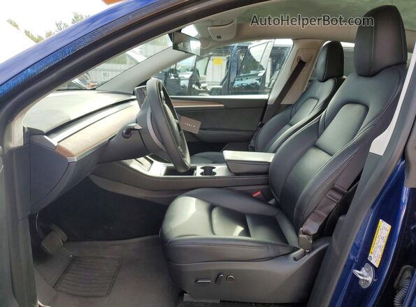 7SAYGAEEXRF982226 2024 TESLA MODEL Blue Front interior view
