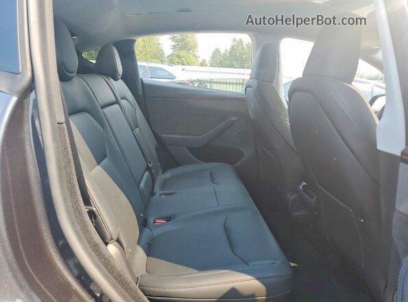 7SAYGDED0TF549207 2026 TESLA MODEL Gray Вид задньої частини салону