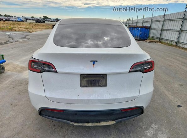 7SAYGDED2RF035707 2024 TESLA MODEL White უკანა ხედი