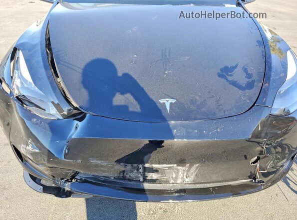 7SAYGDED3RF052693 2024 TESLA MODEL Black უკანა სალონის ხედი