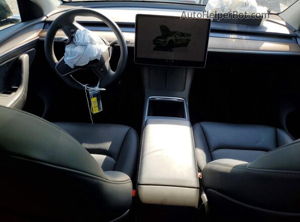 7SAYGDED3SF318655 2025 TESLA MODEL Черный Вид панели приборов