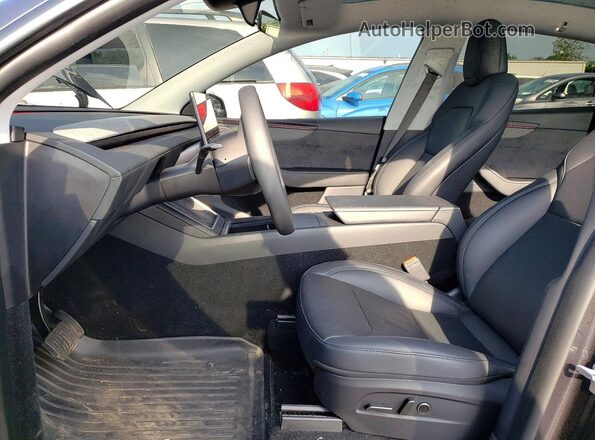 7SAYGDED3TF434990 2026 TESLA MODEL Charcoal Vista interior delantera