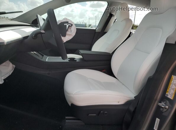 7SAYGDED4RA321930 2024 TESLA MODEL Gray წინა სალონის ხედი