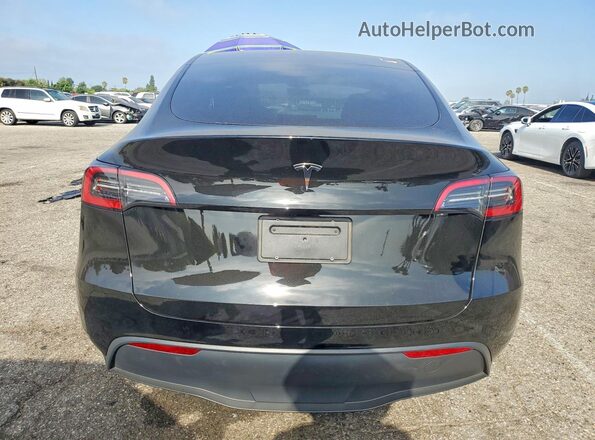 7SAYGDED4RF109760 2024 TESLA MODEL Black Vista trasera