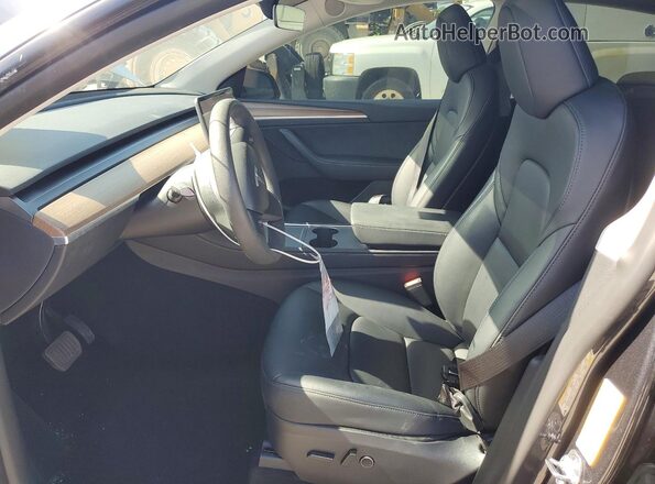 7SAYGDED4SF242248 2025 TESLA MODEL Серый Вид салона спереди