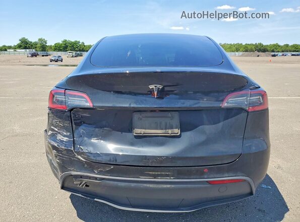 7SAYGDED5PF932811 2023 TESLA MODEL Black Vista trasera
