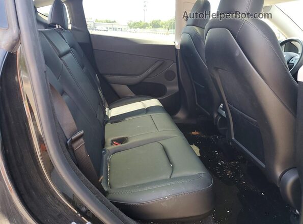 7SAYGDED5PF932811 2023 TESLA MODEL Black Vista de los asientos traseros