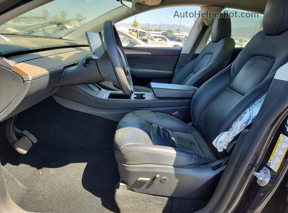 7SAYGDED6RF117052 2024 TESLA MODEL Угольный Вид салона спереди