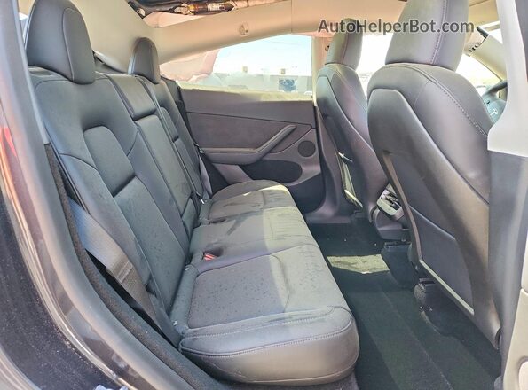 7SAYGDED6RF117052 2024 TESLA MODEL Угольный Вид задней части салона
