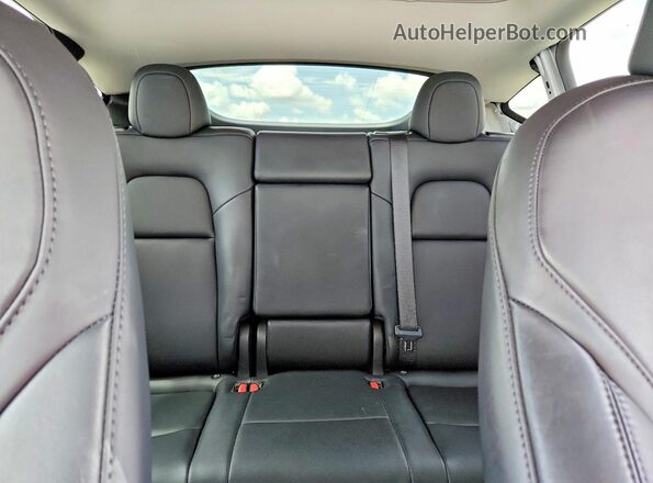 7SAYGDED7RF149945 2024 TESLA MODEL White Vista de los asientos traseros