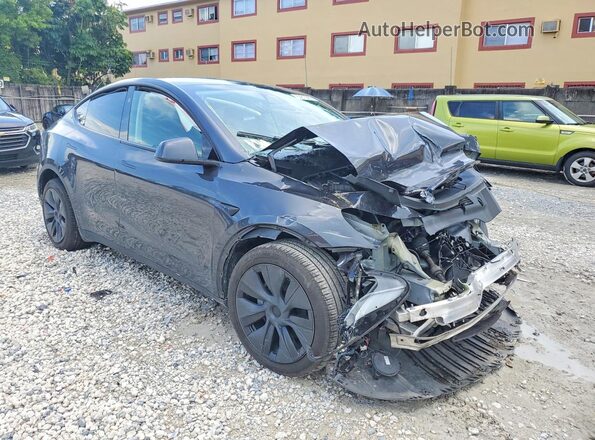 7SAYGDED8SF231737 2025 TESLA MODEL Черный Передняя правая четверть