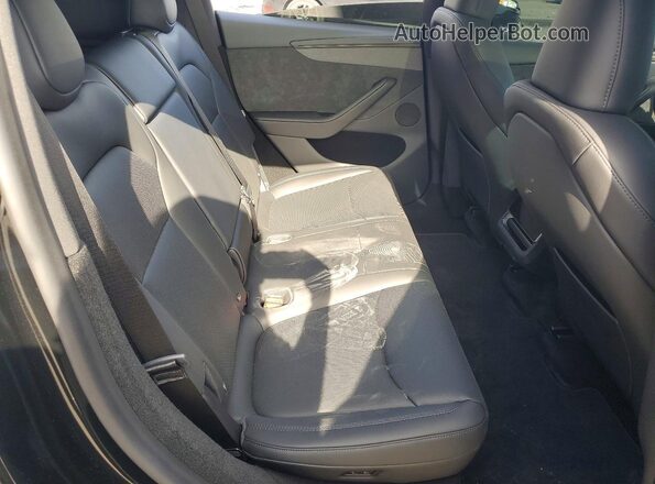 7SAYGDED8TA692659 2026 TESLA MODEL Black უკანა სავარძლების ხედი