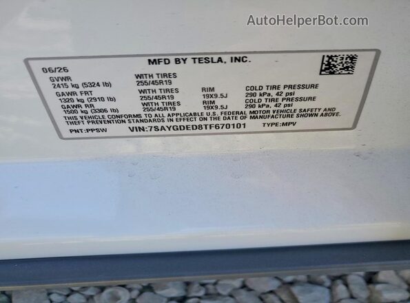 7SAYGDED8TF670101 2026 TESLA MODEL White VIN კოდის სტიკერის ხედი
