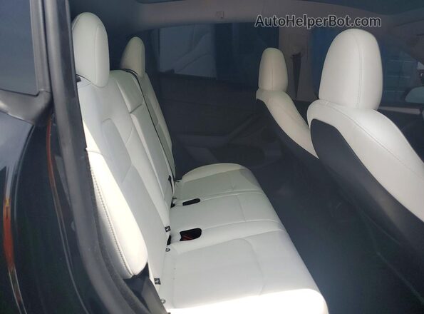 7SAYGDED9RF205402 2024 TESLA MODEL Black უკანა სალონის ხედი