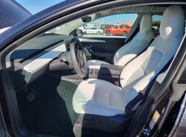 7SAYGDEDXRF206803 2024 TESLA MODEL Угольный Вид салона спереди