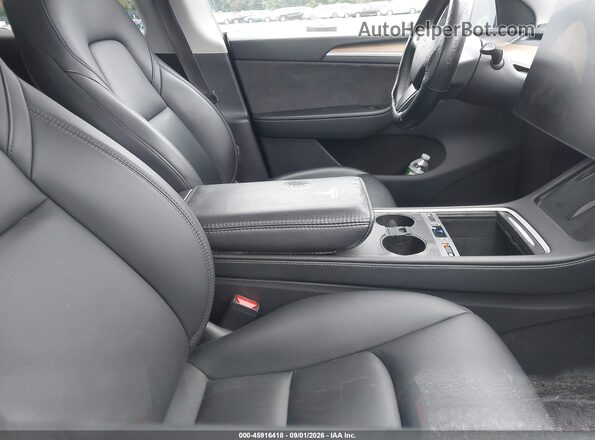 7SAYGDEE0PA183390 2023 TESLA MODEL Y Black წინა სალონის ხედი