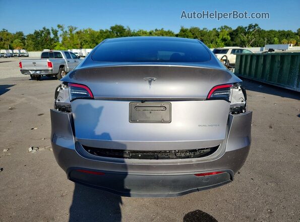 7SAYGDEE0RA299790 2024 TESLA MODEL Silver უკანა ხედი