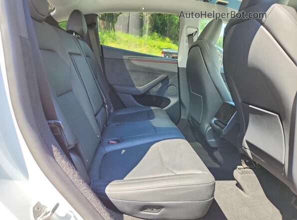 7SAYGDEE0TA448500 2026 TESLA MODEL White Вид задньої частини салону
