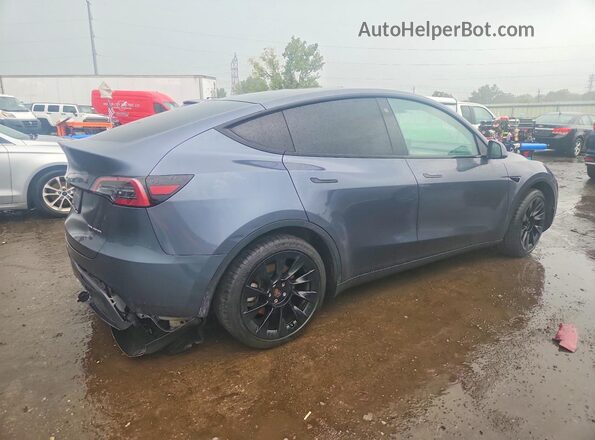 7SAYGDEE1PA051481 2023 TESLA MODEL Gray Հետևի աջ