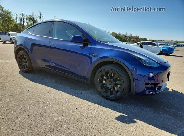7SAYGDEE1PF835307 2023 TESLA MODEL Blue Front right