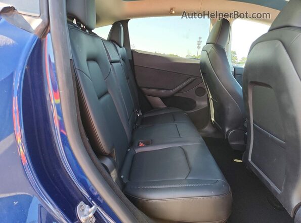 7SAYGDEE1PF835307 2023 TESLA MODEL Blue Rear seats view