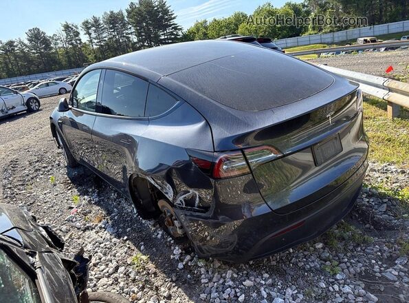 7SAYGDEE1RA229456 2024 TESLA MODEL Black Trasero izquierdo