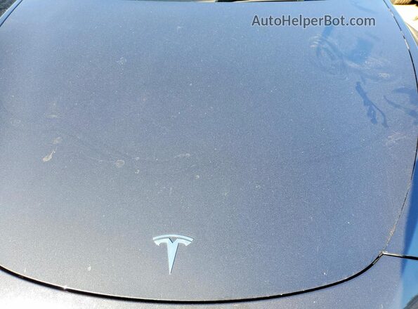 7SAYGDEE1RA229456 2024 TESLA MODEL Black Vista interior trasera