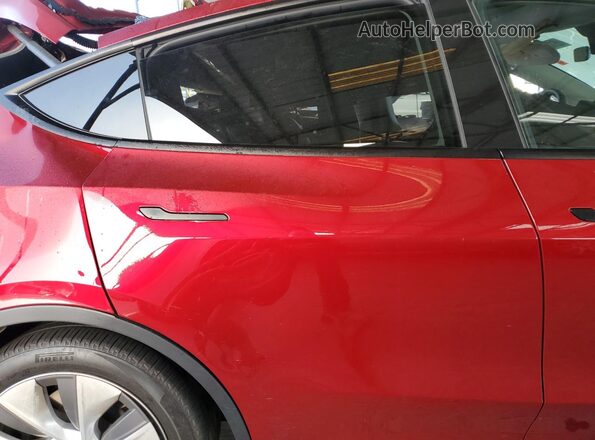 7SAYGDEE2RA227134 2024 TESLA MODEL Red Vista de los asientos traseros