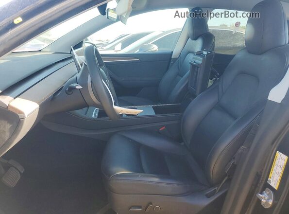 7SAYGDEE2RF014249 2024 TESLA MODEL Charcoal Front interior view