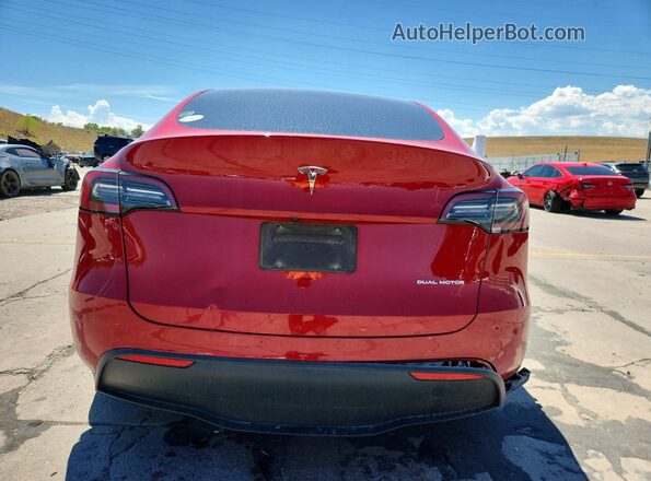 7SAYGDEE3PA064670 2023 TESLA MODEL Red Հետևի տեսք
