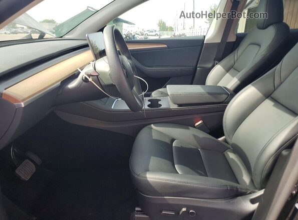 7SAYGDEE3SA353492 2025 TESLA MODEL Black წინა სალონის ხედი