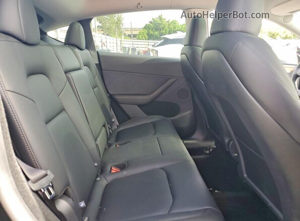 7SAYGDEE3SA353492 2025 TESLA MODEL Black უკანა სავარძლების ხედი