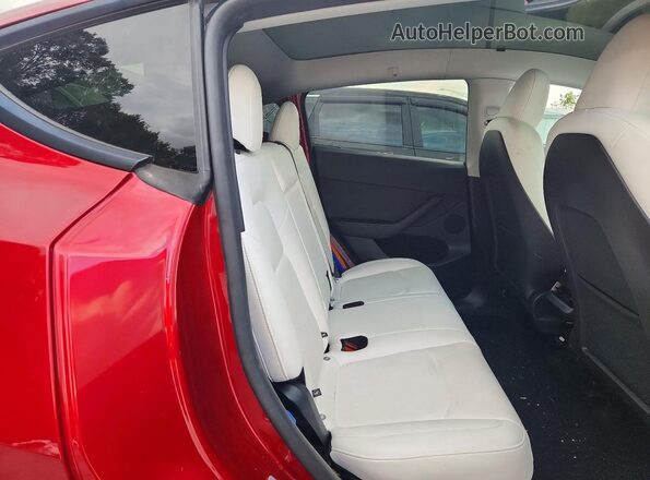7SAYGDEE3SF257106 2025 TESLA MODEL Красный Вид задних сидений