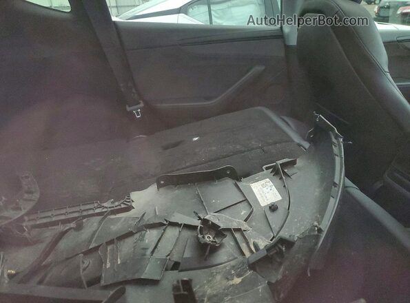 7SAYGDEE3TF446596 2026 TESLA MODEL Gray Vista de los asientos traseros