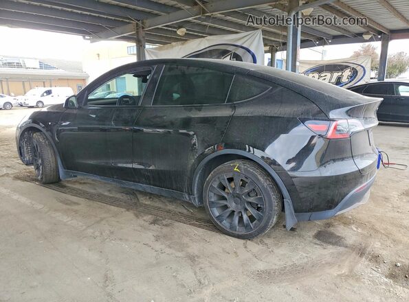 7SAYGDEE4PA136184 2023 TESLA MODEL Black Հետևի ձախ