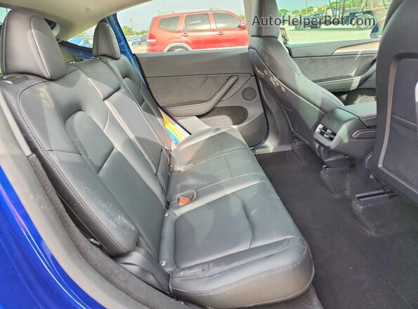 7SAYGDEE4RA283348 2024 TESLA MODEL Blue უკანა სალონის ხედი