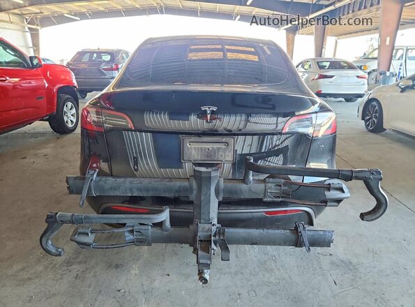 7SAYGDEE5RF155056 2024 TESLA MODEL Черный Вид сзади